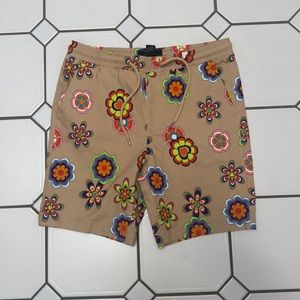 Brand new beige shorts with colorful flowers